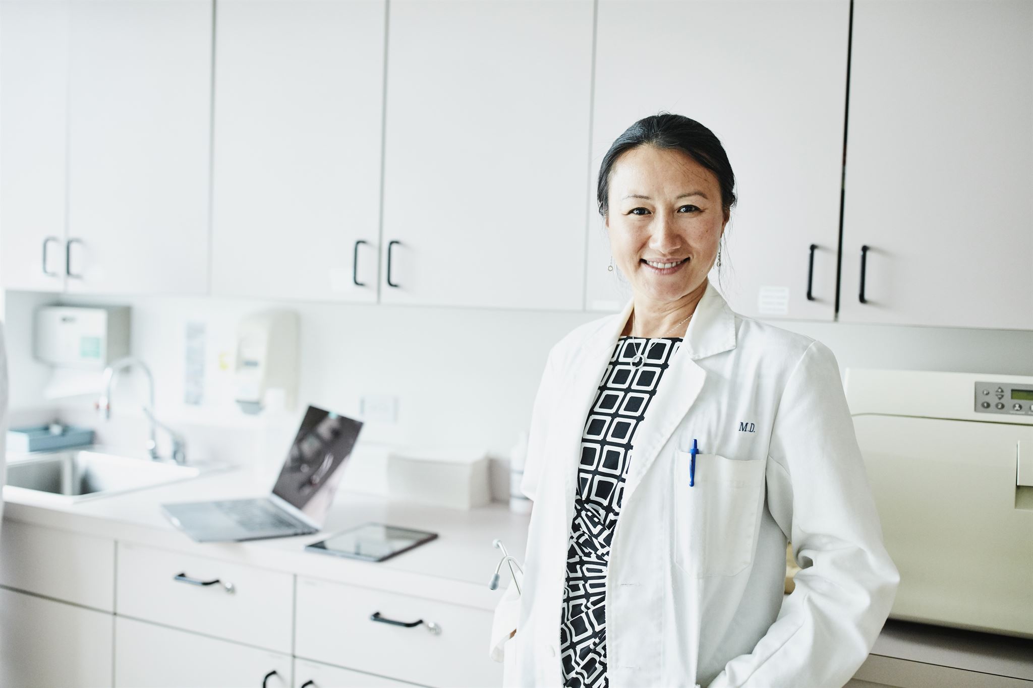 Smiling-doctor-in-lab-coat